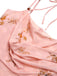 Robe rose à bretelles en satin fleuri et col licou des années 1930