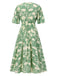 Robe verte fleurs col V des années 1940