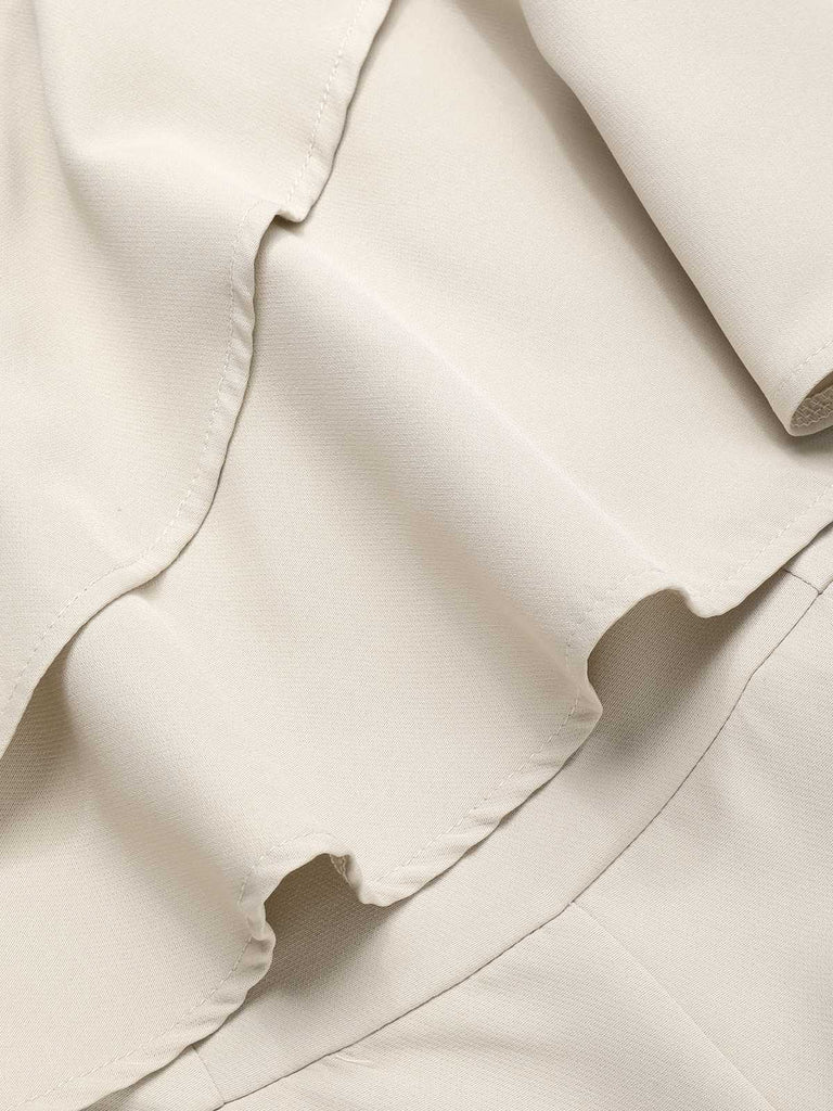 Combinaison beige uni asymétrique à volants étagés des années 1970
