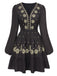 Robe noire à fleurs brodées et décolletée V profond années 1940