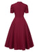 Robe manches bouffantes à col en V unie années 1950