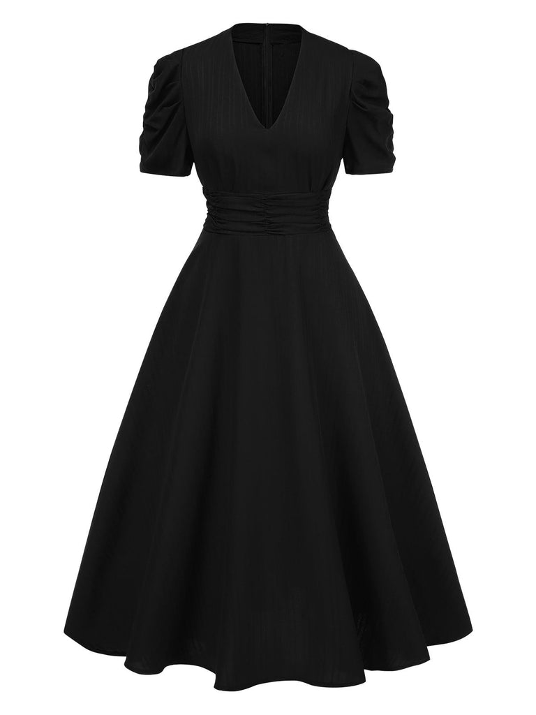 Robe manches bouffantes à col en V unie années 1950