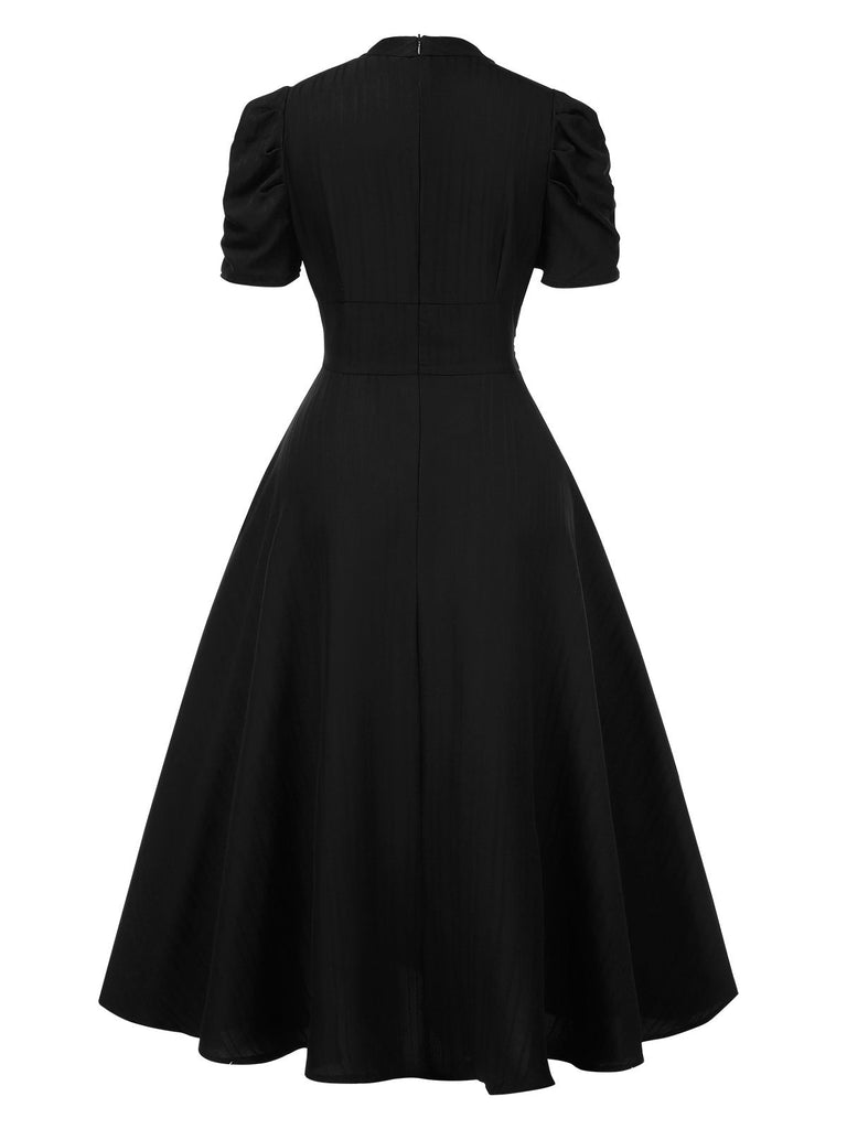 Robe manches bouffantes à col en V unie années 1950