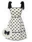 Robe smockée crème à bretelles et nœud papillon des années 1950