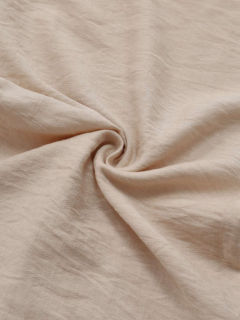 Combinaison beige unie à volants et manches courtes années 1950