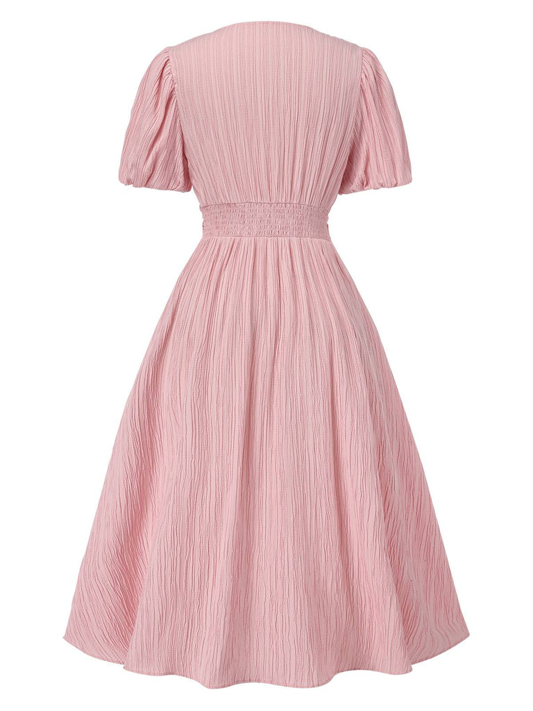 Robe froncée rose rayures fines col V manches bouffantes années 1950