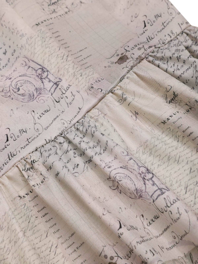 Robe papillons des journal patchwork kaki années 1950
