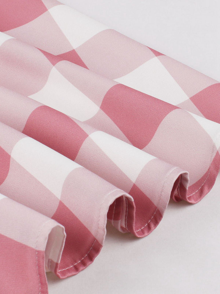 Robe rose à carreaux vichy avec nœud et boutons années 1950