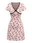 Robe rose en maille col V imprimé nœuds des années 1960