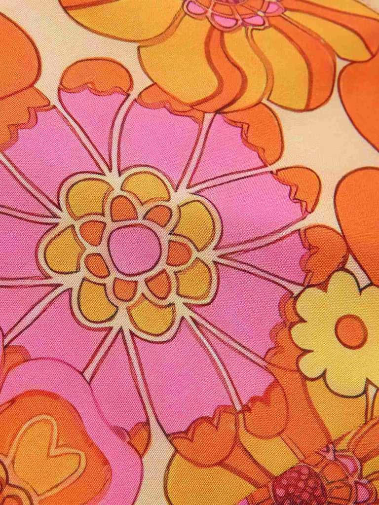 Haut dos nu fleuri hippie orange des années 1960