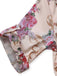Combinaison verte symétrique à fleurs à col chemise années 1930