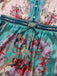 Combinaison verte symétrique à fleurs à col chemise années 1930