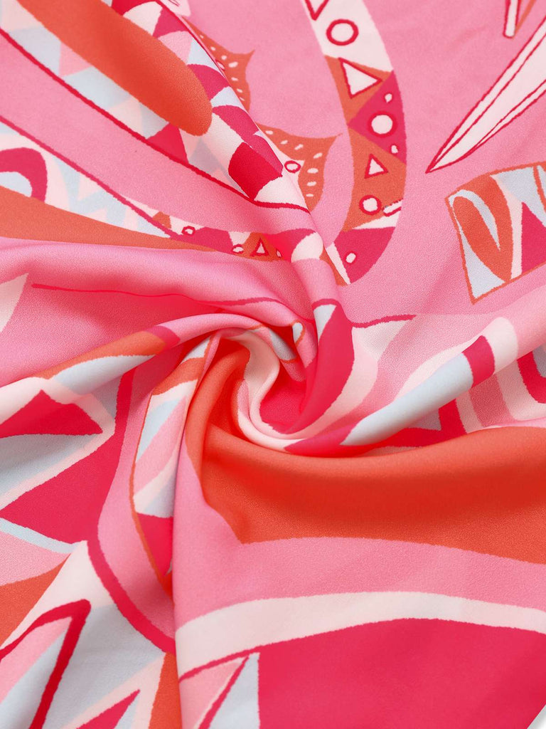 Combinaison bohème rose à revers et ceinture des années 1930