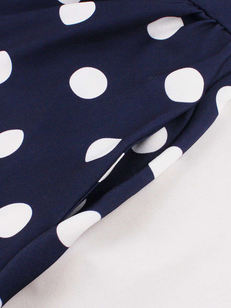 Robe trapèze bleu foncé à pois des années 1950