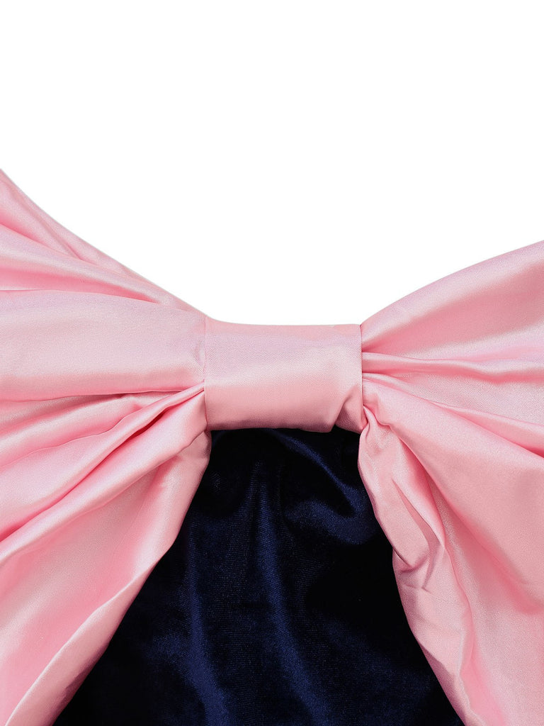 Robe rose velours à gros nœud épaules dénudées années 1960