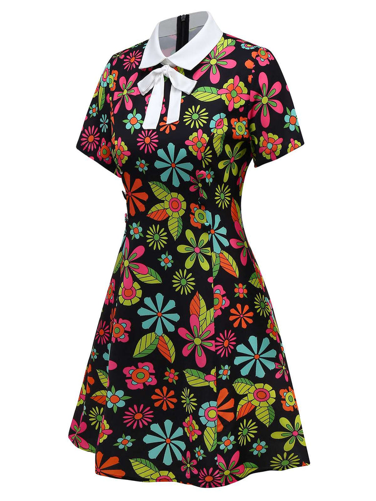 [Prévente] Robe noire à col nœud et motif floral hippie des années 1960