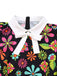 [Prévente] Robe noire à col nœud et motif floral hippie des années 1960