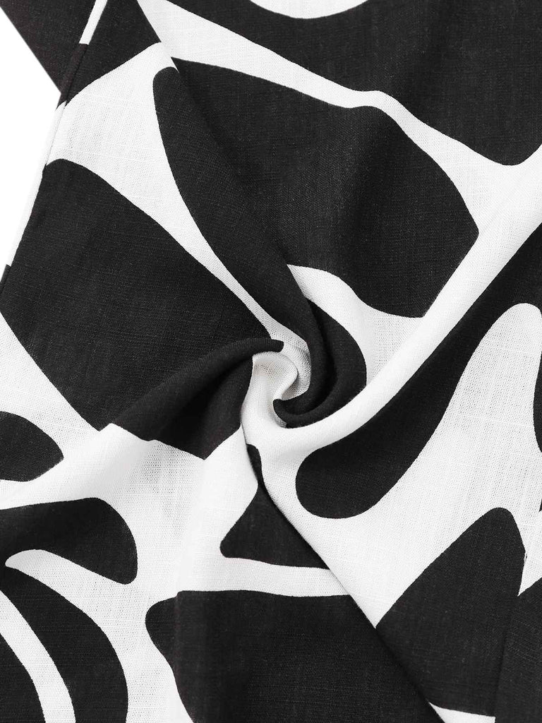 Combinaison ceinturée noire et blanche à motif de plantes des années 1950