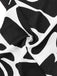 Combinaison ceinturée noire et blanche à motif de plantes des années 1950