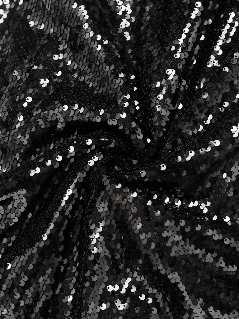 Robe noire à bretelles spaghetti et paillettes nouées dans le dos des années 1930