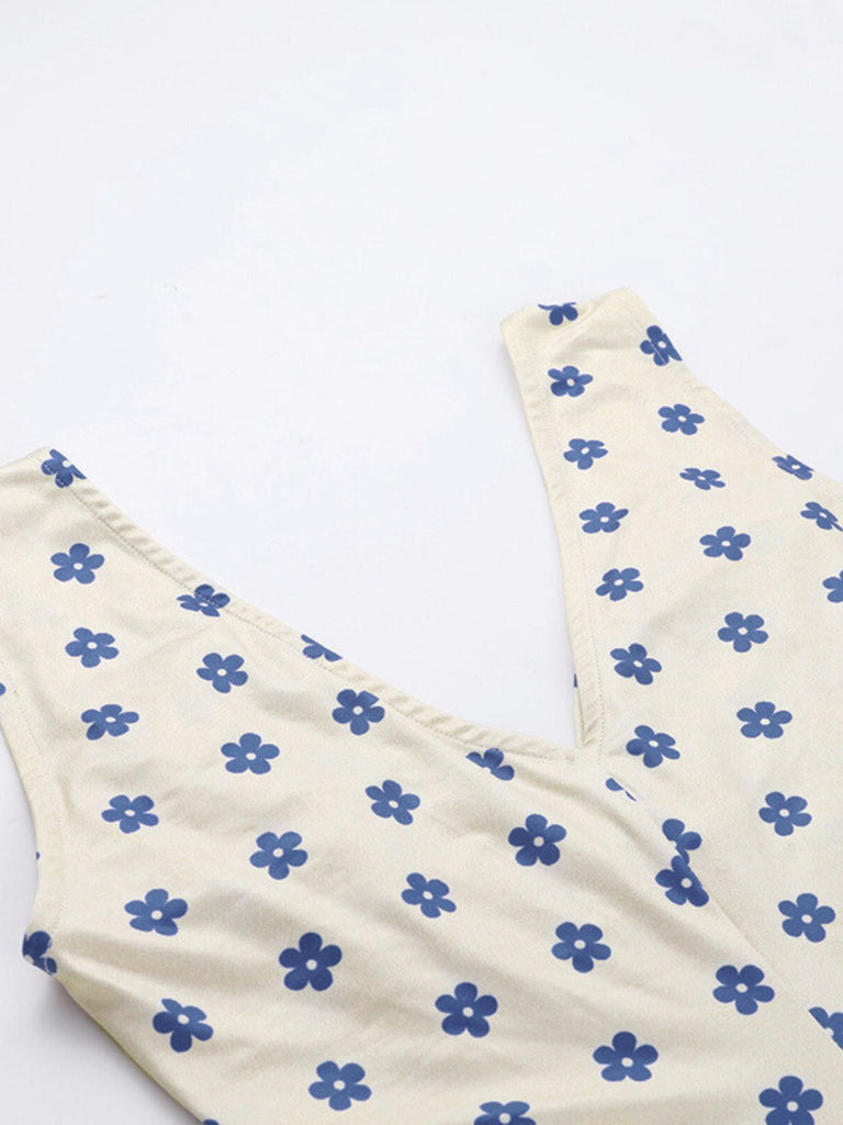 Robe à fleurs bleu et abricot larges bretelles col V profond des années 1960