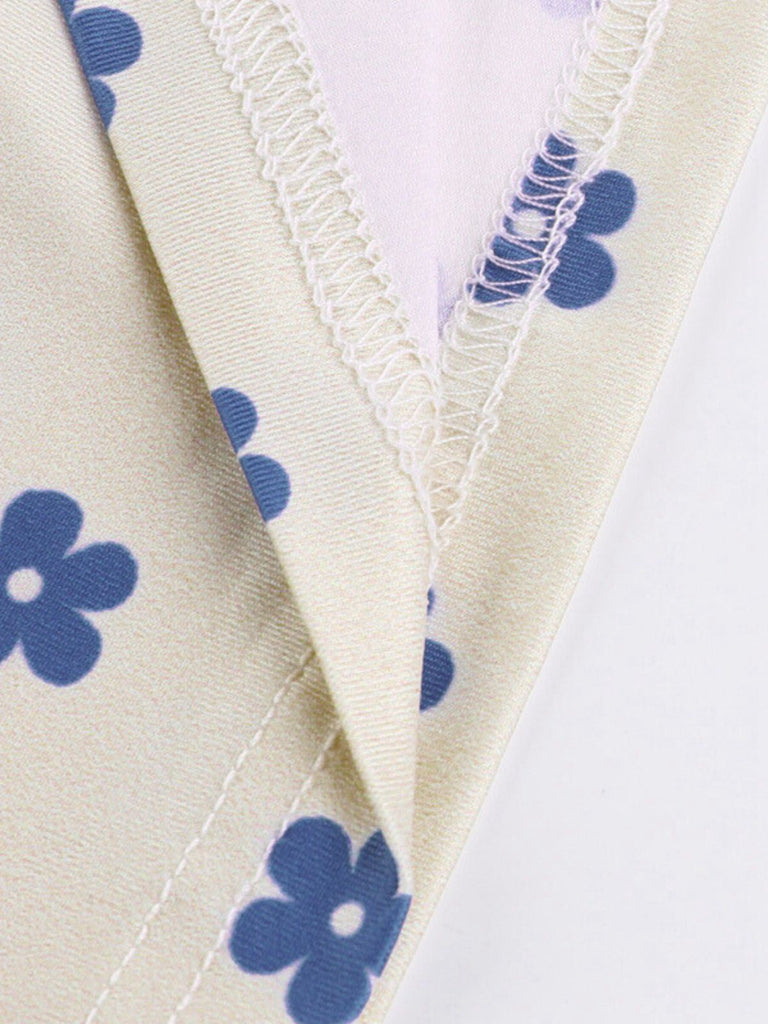 Robe à fleurs bleu et abricot larges bretelles col V profond des années 1960