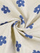 Robe à fleurs bleu et abricot larges bretelles col V profond des années 1960