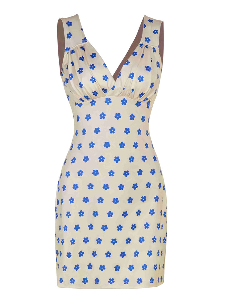 Robe à fleurs bleu et abricot larges bretelles col V profond des années 1960
