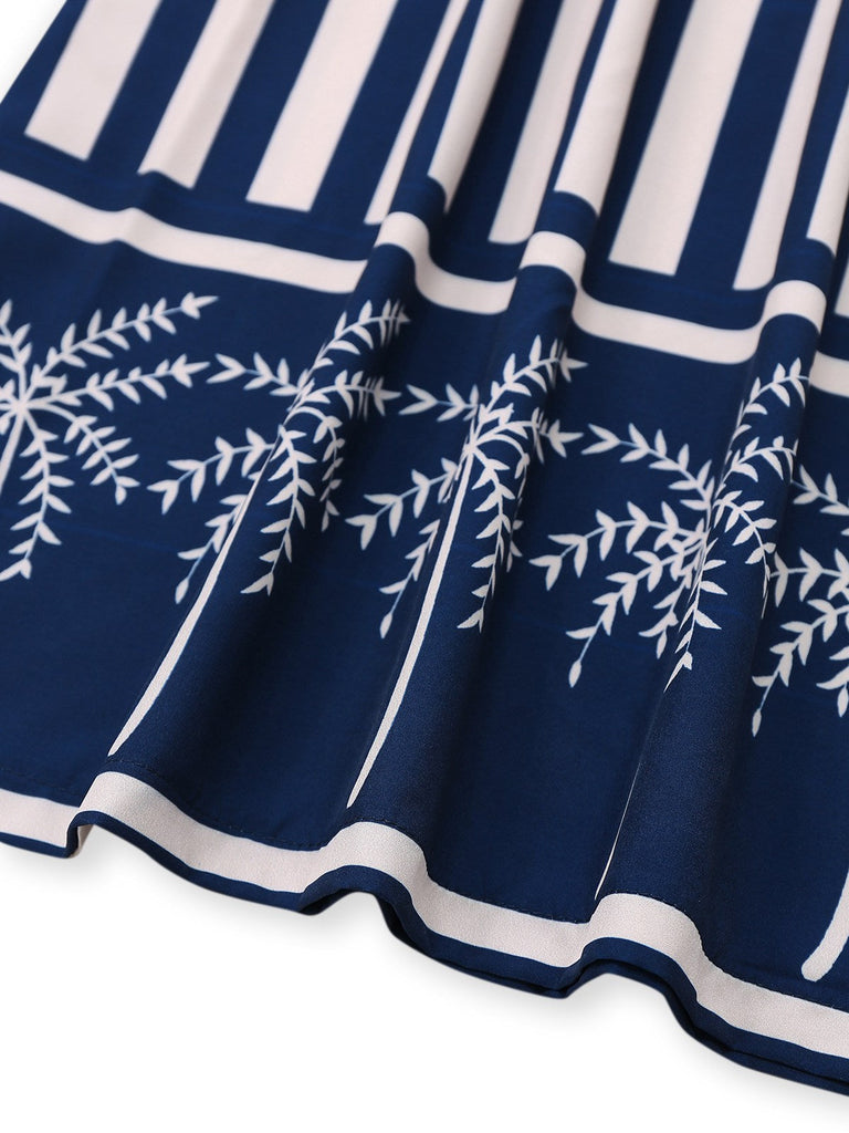 Combinaison bleue à rayures verticales et palmiers des années 1930