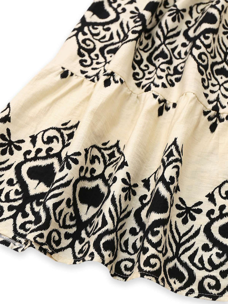 Robe abricot manches mancheron col V imprimé piques années 1970
