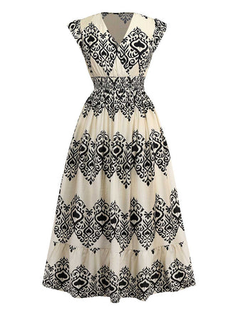 Robe abricot manches mancheron col V imprimé piques années 1970