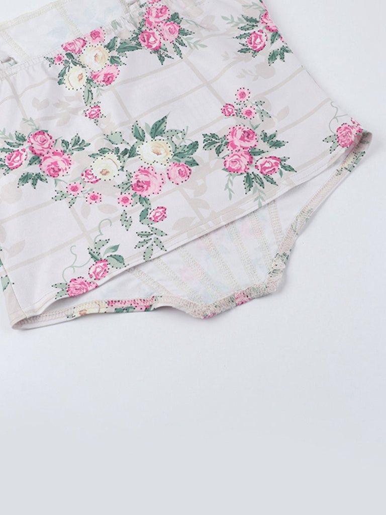 Haut corset rose à bretelles spaghetti florales des années 1950