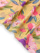 Robe jaune fleur à volants et col en V profond années 1930