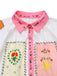 Robe ceinturée multicolore fleurs motif soleil et lune des années 1930