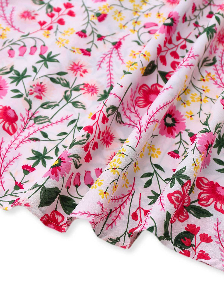 Robe fleurie rose manches volantées col V des années 1940