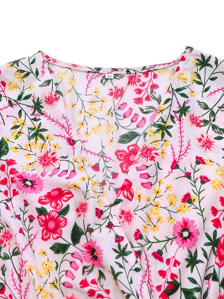 Robe fleurie rose manches volantées col V des années 1940