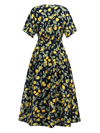 Robe en mousseline de soie jaune citron col V et smocks des années 1950