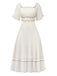 Robe abricot à col carré et bordure texturée années 1930