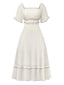 Robe abricot à col carré et bordure texturée années 1930