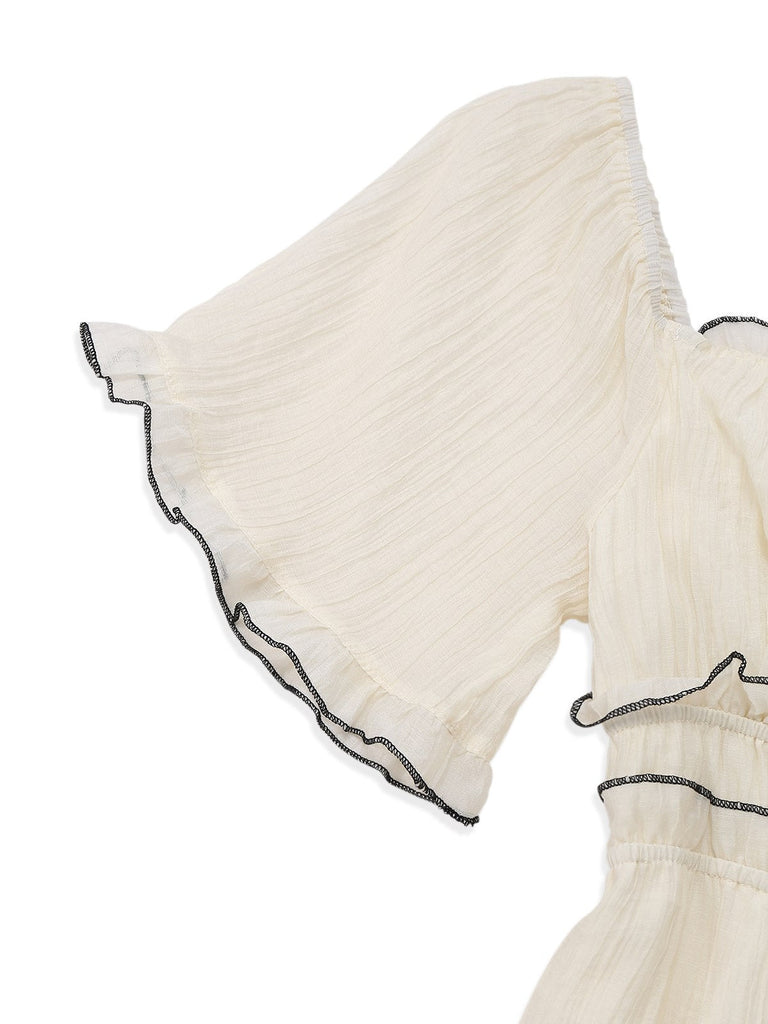 Robe abricot à col carré et bordure texturée années 1930