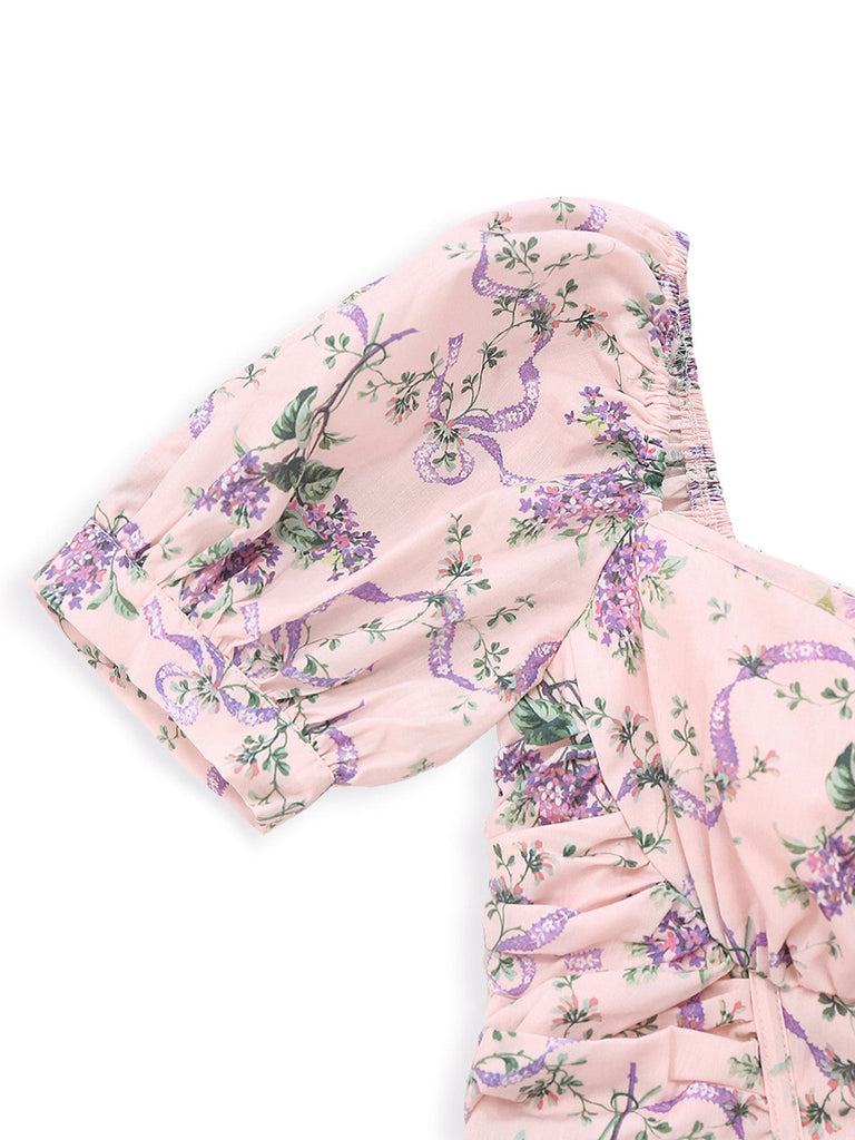 Robe rose imprimé lavande col en cœur manches bouffantes des années 1940