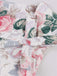 Robe trapèze rose motif fleurs et col en cœur des années 1950