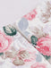 Robe trapèze rose motif fleurs et col en cœur des années 1950