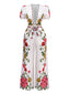 Combinaison blanche fleur à col en V profond années 1950