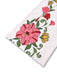 Combinaison blanche fleur à col en V profond années 1950