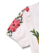 Combinaison blanche fleur à col en V profond années 1950