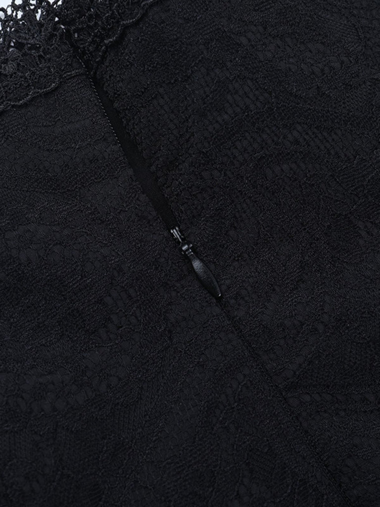 Jupe corset noire à lacets en dentelle patchwork années 1970