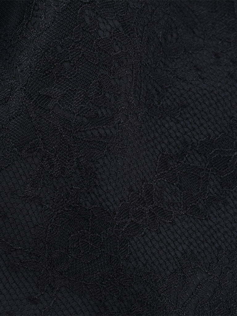 Jupe corset noire à lacets en dentelle patchwork années 1970