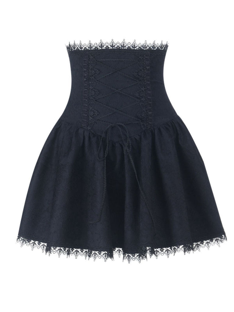 Jupe corset noire à lacets en dentelle patchwork années 1970