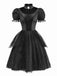 Robe noire en maille à manches bouffantes style vampire années 1950